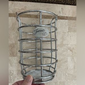 Fiestaware metal utensil holder.